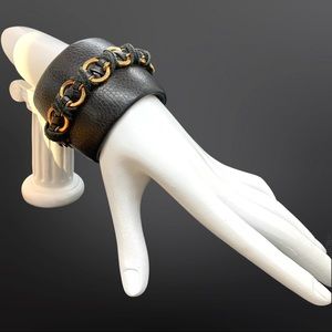 Leather cuff bracelet with gold accents